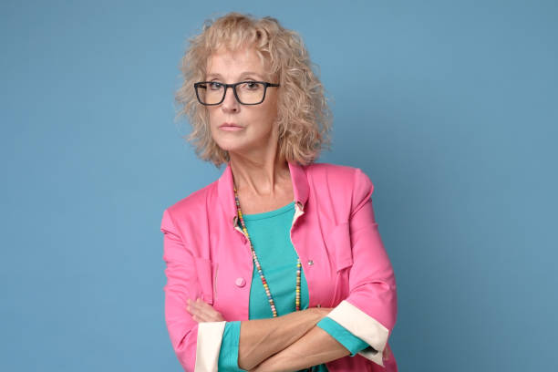 istock Strict confident teacher professional director in glasses looking at camera 1199992251