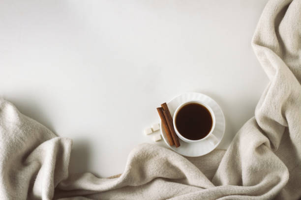 istock Cup with Coffee, Scarf on the White Background. Flat lay, top view 1199992500