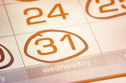 the thirty-first day of the month highlighted on the calendar with a round frame close-up macro, the mark on the calendar, the thirty-first date, toned, bright, light