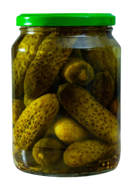istock Marinated cucumbers in glass jar 1199996811