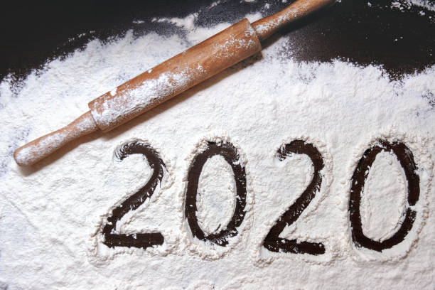 istock numbers 2020 paint on flour table and rolling pin diagonal up 1199996891