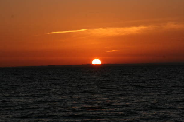 istock A beautiful sunset with a continuous sunset until the sun goes down on the horizon 1199998248