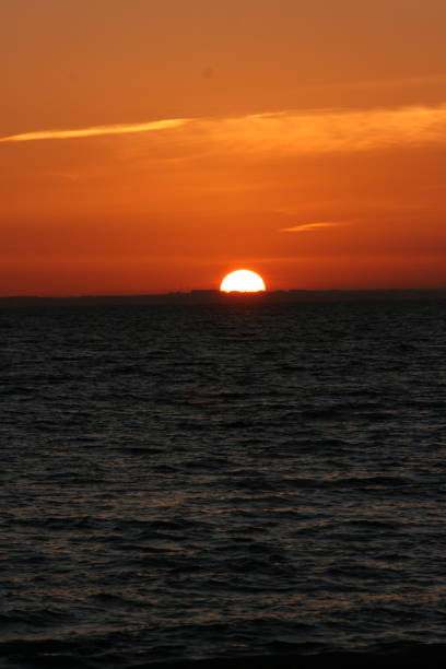 istock A beautiful sunset with a continuous sunset until the sun goes down on the horizon 1199998255