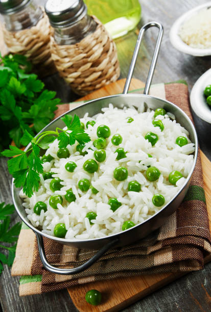 Rice with green peas stock photo