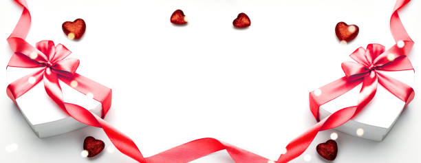 istock Valentines day card. Heart shaped gift box with red ribbon isolated on white. Romantic message template with copy space. 1200006510