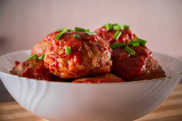 istock Meat balls with tomato sauce and herbs. 1200013678