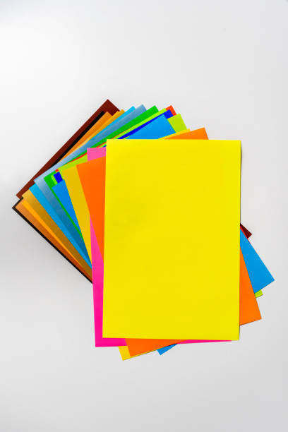 istock stack of of color paper sheets on the table flat lay, view from above 1200022363