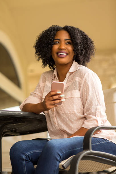istock African American woman texting. 1200022592