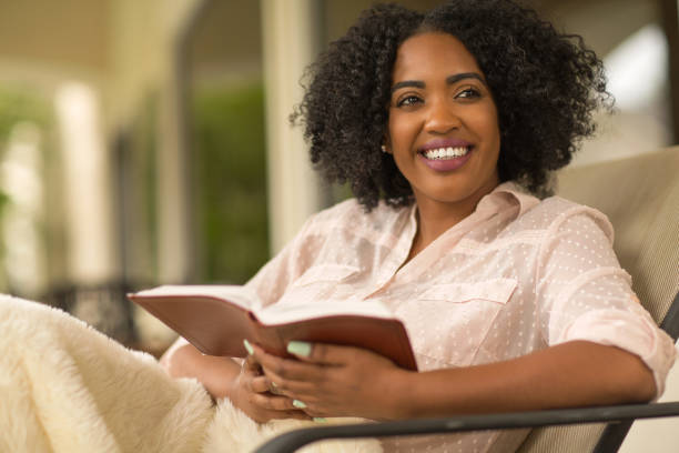istock Woman smiling and looking away. 1200022673
