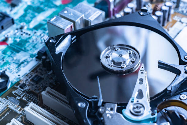 the macro view of thye hdd drive with information data, magnetic disc, electronic board background