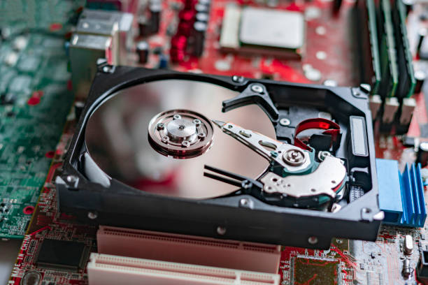 istock the macro view of thye hdd drive with information data, magnetic disc, electronic board background 1200023261