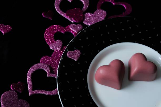 istock Heart-shaped pink chocolate 1200027553