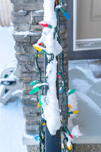 istock Christmas lights covered in snow oh house railings 1200028575