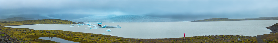 Panorama view of icebergs in Fjallsarlon glacial lagoon in Iceland, The Fjallsarlon glacial is a large glacial lake in southeast Iceland, on the edge of Vatnajokull National Park