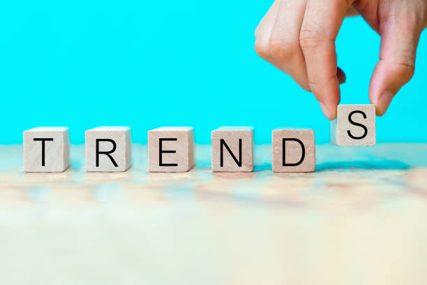 istock Word trends on wooden blocks with hand 1200034389