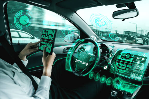 istock Self-drive autonomous car with man at driver seat. 1200037205