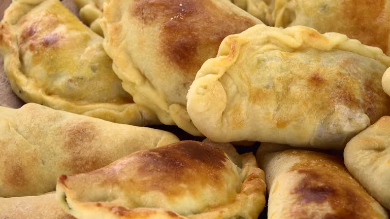 Homemade Empanadas on a rotating plate (seamless loopable)