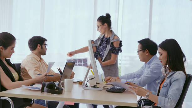 istock Senior leader giving advice speech to team members 1200039574