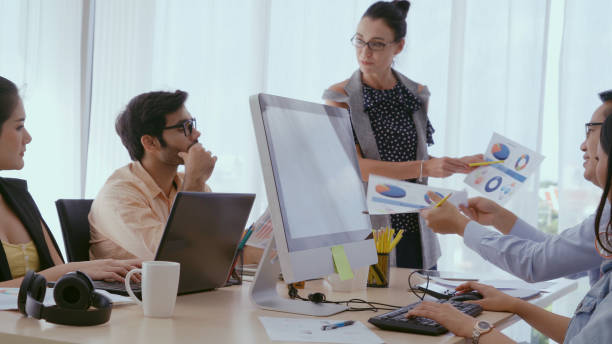 istock Senior leader giving advice speech to team members 1200039579