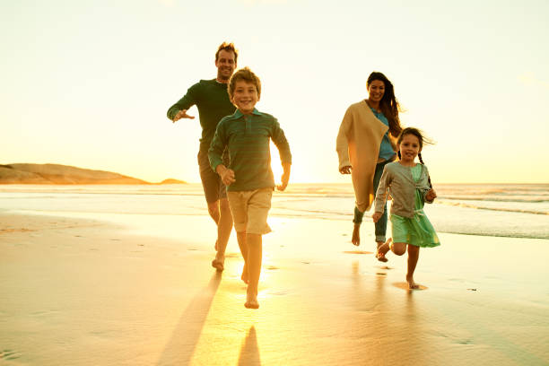 istock Our kids just love the beach 1200039819