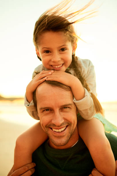 istock She gets her love for the beach from me 1200039834