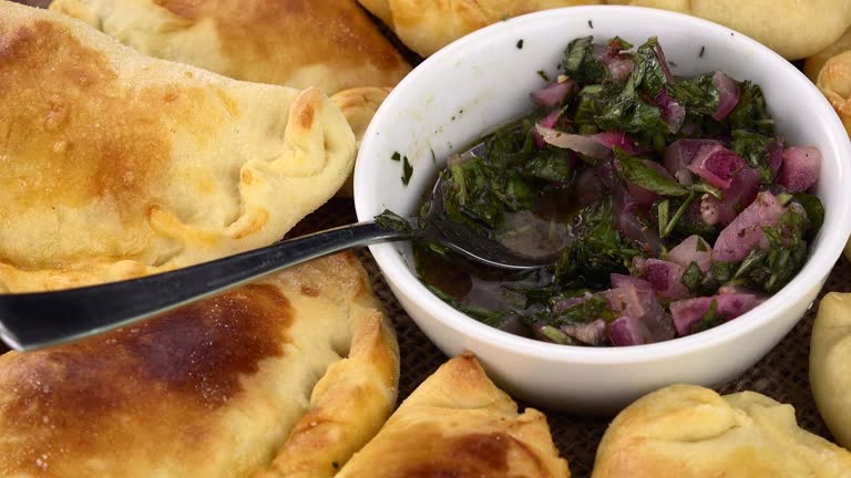 Homemade Empanadas on a rotating plate (seamless loopable)