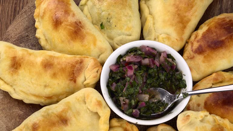 Homemade Empanadas on a rotating plate (seamless loopable)