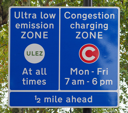 ULEZ (Ultra low emission zone at all times) and C (Congestion charging zone) signs in London, UK