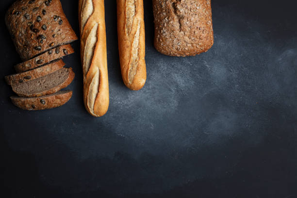 istock Freshly baked bread on wooden table 1200059832