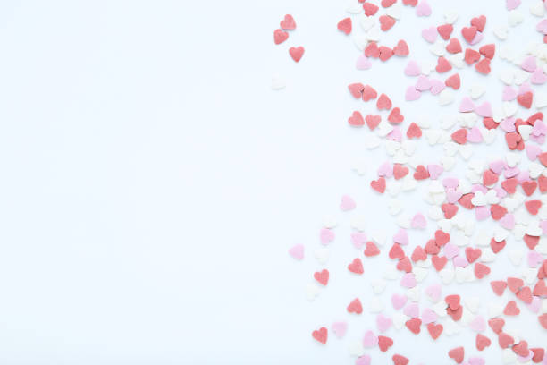 istock Heart shaped sprinkles on white background 1200063510