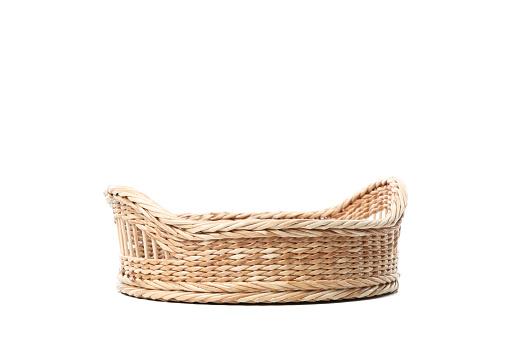 Big wicker basket isolated on white background