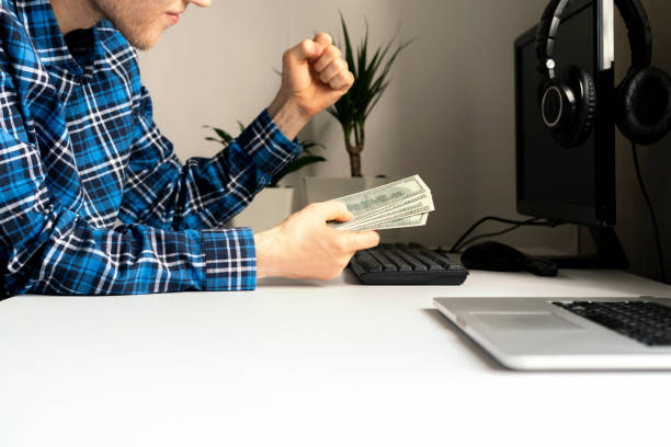 istock working at home. side hustle, person earned money via computer using internet. 1200064661