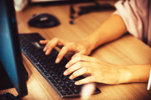 istock Close-up of entrepreneur typing on computer keyboard. 1200068138