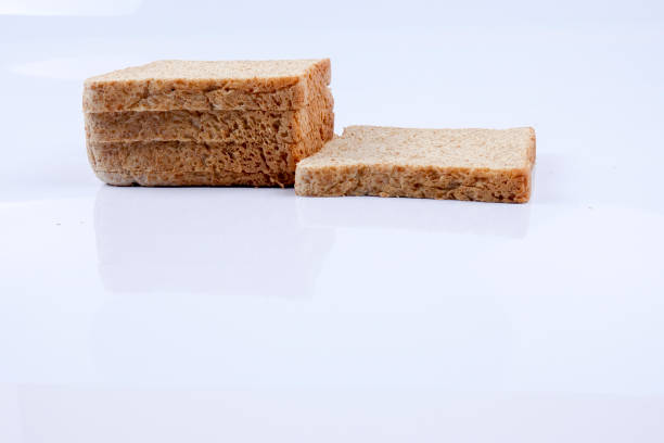 istock Loaf of wholemeal bread on white background 1200071604