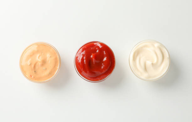 istock Set of tasty sauces on white background, space for text. Top view 1200072589