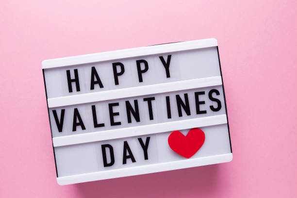 istock Box with the inscription Happy Valentine's Day on a pink background 1200079507
