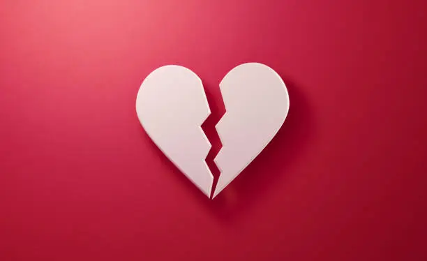 White heart shape over red background, Horizontal composition. Valentine's Day concept.