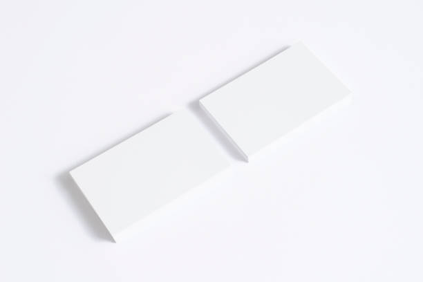 istock Blank business cards stack isolated on white. Mockup template for graphic designers presentations and portfolios. 3d render. 1200081216