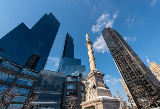 Time Warner Center at Columbus Circle, NYC New York City, USA - February 10, 2014: Monument of Christopher Columbus in Columbus Circle and Time Warner Center with Trump International Hotel and Tower in Manhattan, New York City, USA time warner center columbus circle pictures stock pictures, royalty-free photos & images