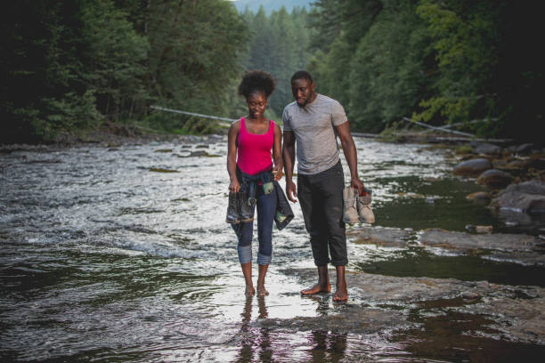 istock Barefoot Couple Enjoying Nature 1200083884
