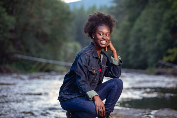 istock Beautiful Young Woman Enjoying Nature 1200083887
