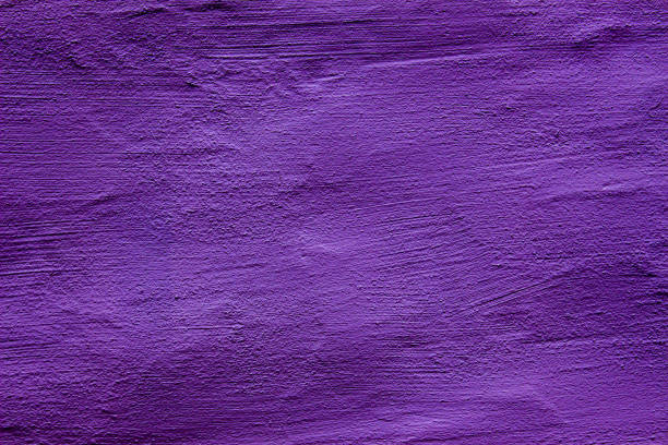 istock Abstract textured background in purple 1200091376