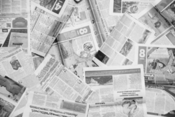 Blurred Background of Newspaper Pages stock photo