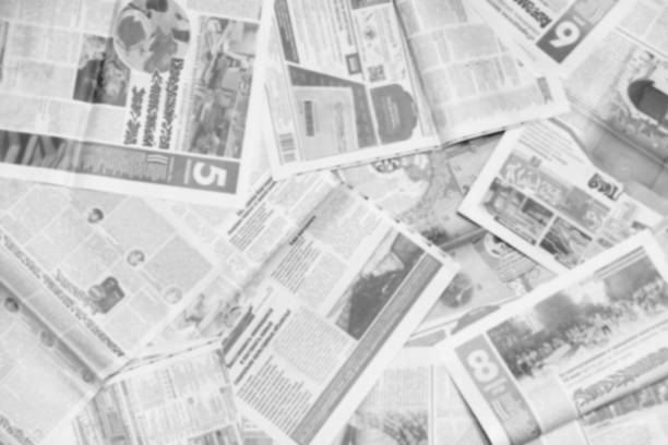 istock Blurred Background of Newspaper Pages 1200091405