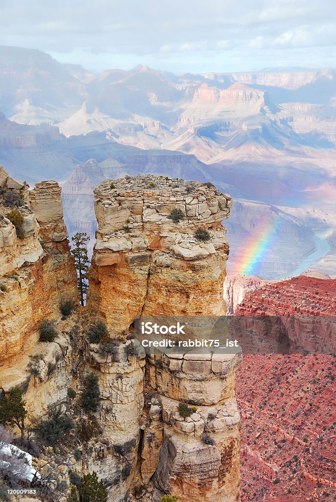Grand Canyon in winter with snow and rainbow Grand Canyon panorama view in winter with snow and rainbow Grand Canyon Stock Photo