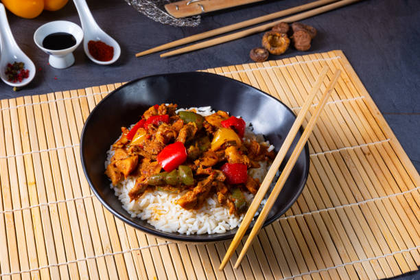 istock Hot roasted chicken with rice and vegetables 1200093495