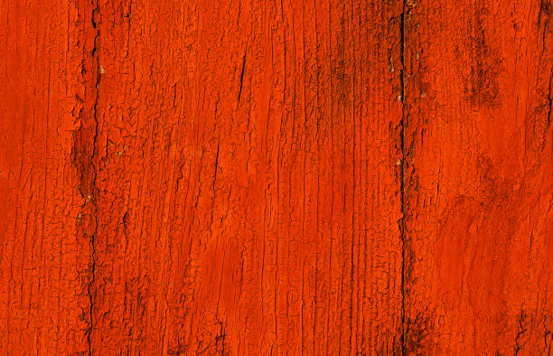 istock Red painted wooden board background 1200094197