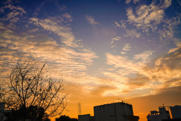 Beautiful sunrise or sunset lighting the clouds softly