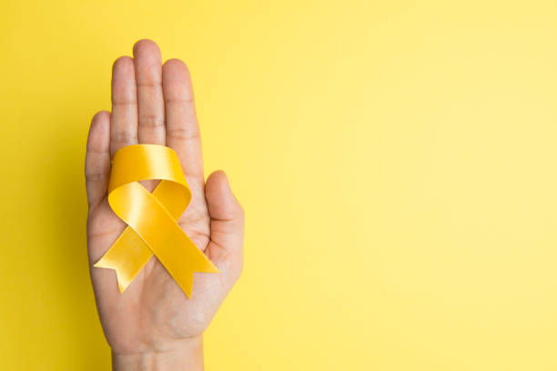 istock Yellow Awareness Ribbon 1200096907