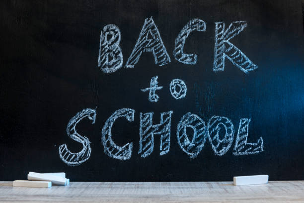 istock School blackboard with text 'Back to school' . September and education concept 1200098792